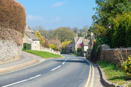 Main road passing through a small Cotswold villageの写真素材
