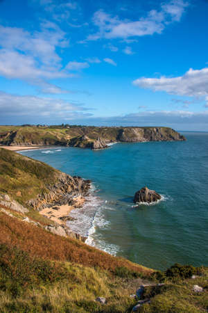 View of Three Cliffs Bay in Wales from a hill top