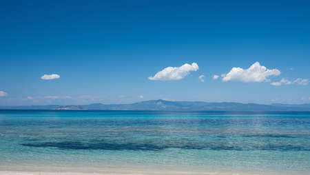 View across a clear blue sea