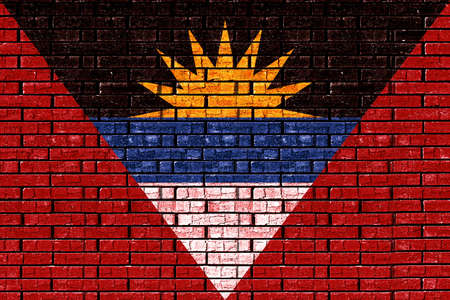 Illustration of the flag of Antigua and Barbuda looking like it is painted onto a wallの写真素材