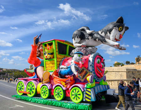 Valletta,Malta - February 23 2020 : Carnival floats on the parade through the city streets of...