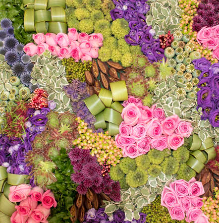 Colourful Flower Collage Colourful flowers ,plants and leaves have been arranged to form a  collage.の写真素材
