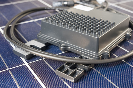 solaredge, solar panel power optimizer close up, solar cells backgroundのeditorial素材