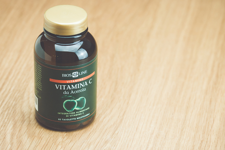 Inverigo, Italy - September 10, 2016: BIOS LINE C vitamin tablets nutritional supplement in a glass bottleのeditorial素材