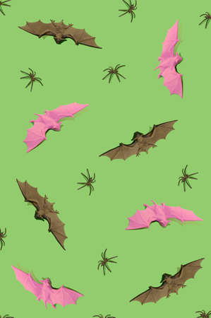 Purple bat, black bat and spider on a green background. Halloween horror conceptの写真素材