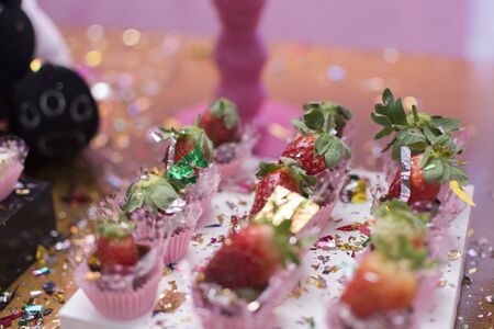 Girl birthday party decoration detail Panda theme. Wonderful sweets, cupcakes, cake, boxes and designs. 1 year old birthday. Cute girl party decoration.Selective focus.の写真素材
