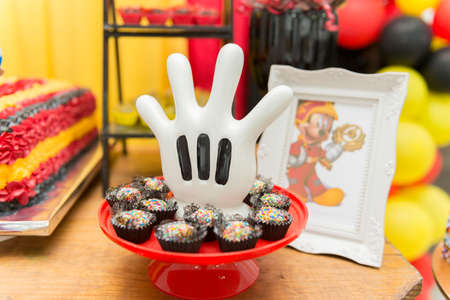 Florianopolis - Brazil, October 1, 2019: Cake table decoration in kids party with Mickey theme....