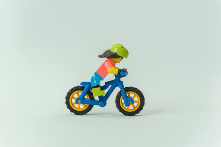 Florianopolis - Brazil, February 2, 2020: Side view of minifigure wearing protective gear and...