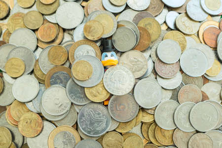 FlorianÃ³polis - Brazil, July 9, 2019: Minifigure of Scrooge McDuck covered by many coins. Lego minifigures are manufactured by The Lego Group.のeditorial素材