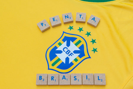 Bauru, Brazil - 11.01.23: Brazilian Football Confederation emblem on football jersey. Most times world champion selection shirt in football. Highlight for the shield of the shirt of the Brazilian teamのeditorial素材