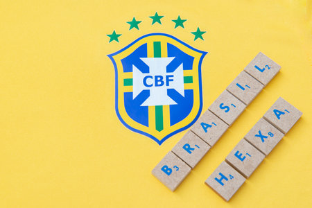 Bauru, Brazil - 11.01.23: Brazilian Football Confederation emblem on football jersey. Most times world champion selection shirt in football. Highlight for the shield of the shirt of the Brazilian teamのeditorial素材