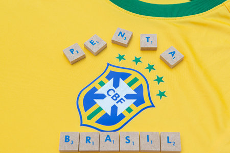 Bauru, Brazil - 11.01.23: Brazilian Football Confederation emblem on football jersey. Most times world champion selection shirt in football. Highlight for the shield of the shirt of the Brazilian teamのeditorial素材