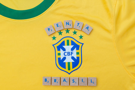 Bauru, Brazil - 11.01.23: Brazilian Football Confederation emblem on football jersey. Most times world champion selection shirt in football. Highlight for the shield of the shirt of the Brazilian teamのeditorial素材