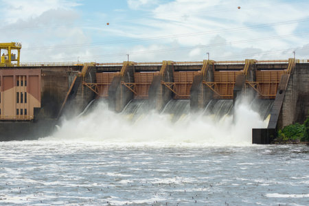 Closeup of Barra Bonita dam with open hydroelectric plant gates. The Barra Bonita Lock is used for vessels to cross the gaps between the upper and lower levels of the dam.の写真素材