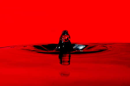 Red abstract water drop. Macro close up shotの写真素材