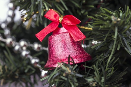 Christmas bell on Christmas treeの写真素材