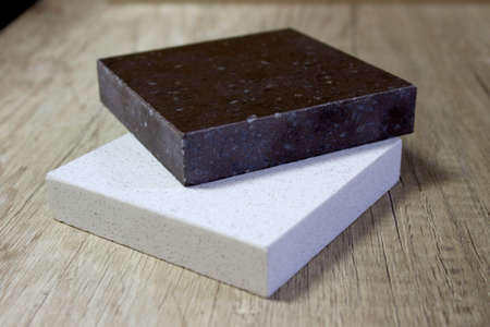 sample acrylic artificial stone on a wooden table