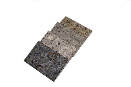 a few samples of acrylic artificial stone on a white background