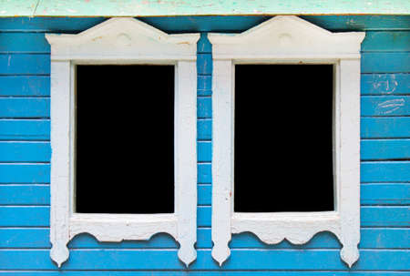 Children's wooden house with two windows of a smoother color