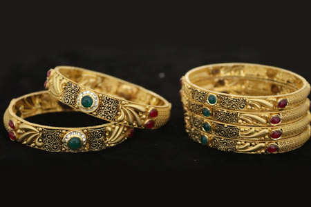 Two Bangles Or Kadas Or Kangan places on a surface being focusedの写真素材