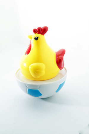 Chicken toy on isolated white backgroundの写真素材
