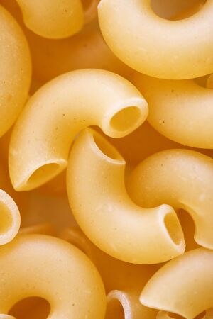 Some yellow macaroni for backgroundsの写真素材