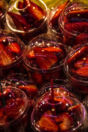 Set packed slice of fresh fruits in the famous La Boqueria の写真素材