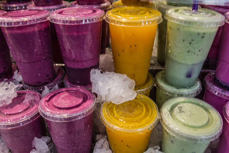 Set packed slice of fresh fruits in the famous La Boqueria の写真素材