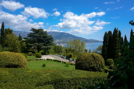 beautiful garden at the Livadia Palace in the Crimea against the sea and the city of Yaltaのeditorial素材