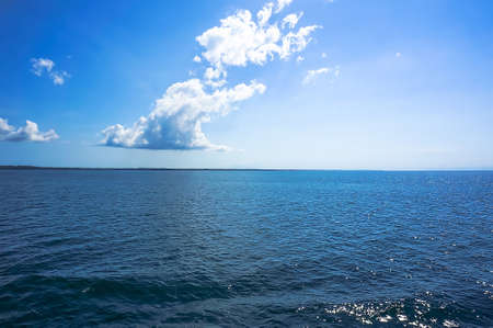 views of the blue at the horizon on a blue seaの写真素材
