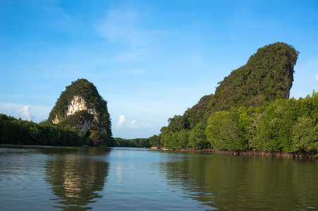 two high rocks are the main attraction of Krabi Thailand. river between two high cliffs.の写真素材