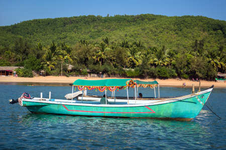 Indian boat in the Sea on the beach background. Gokarna India