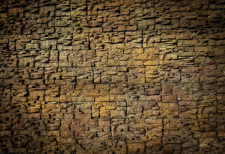 Modern brick wall. background of small blocks brown colour