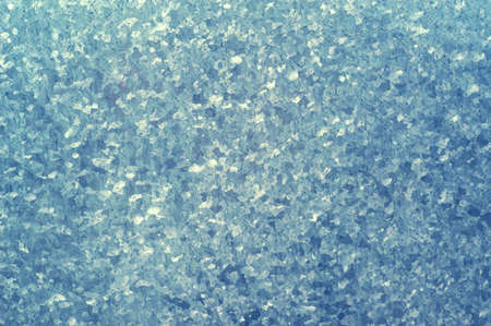 Background of small blue spots on the metal.の写真素材