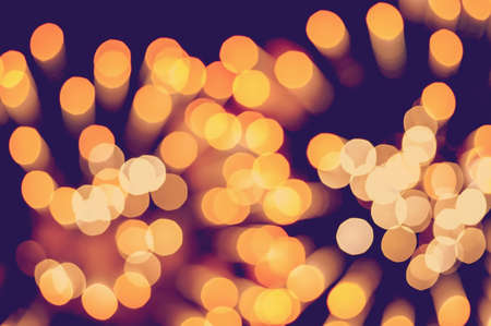 Festive elegant abstract background with bokeh lights and starsの写真素材