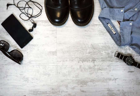 Men's casual outfits with accessories on on wood background with vitage color still lifeの写真素材