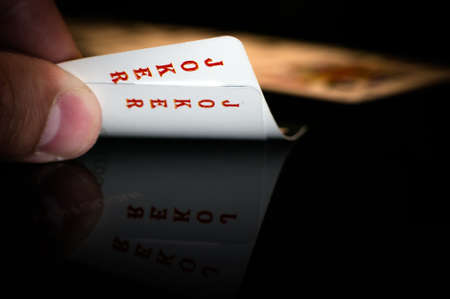 two Joker card in the hand of the player.の写真素材
