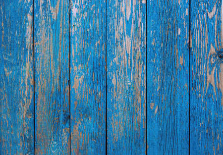 wooden fence old blue color as a background or texture. Vintage painted wooden boardsの写真素材