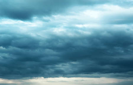 Large Cumulus clouds blue, blue sky before the rain. Approaching stormの写真素材