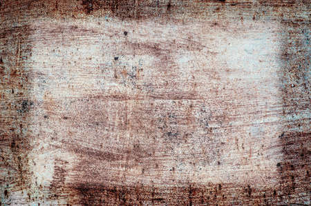 Old Damaged Wall Cracked Paint, Grunge Background, brown color. The texture of the brown paint on the old wall.の写真素材
