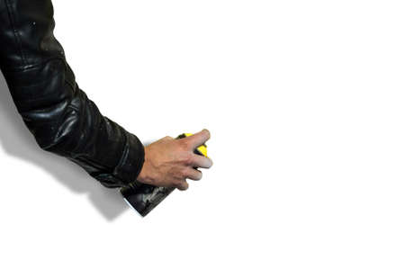 graffiti spray can in hand isolated on white backgroundの写真素材