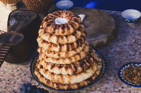 Wheat and bread, asian tortillas on a wooden background. The middle East. Oriental flavorの写真素材