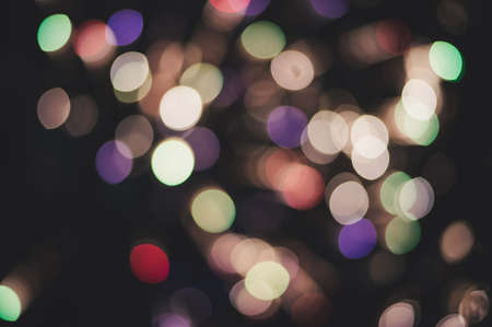 Photo of bokeh lights on black background. Christmas and new year background of fireworks.の写真素材