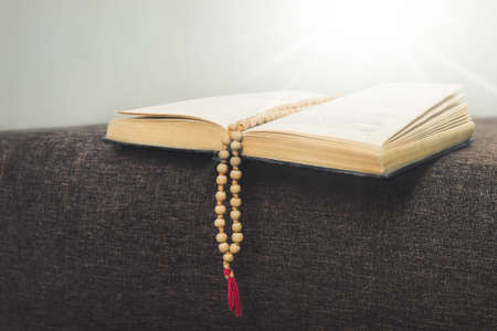 still life with books and rosary in the church.