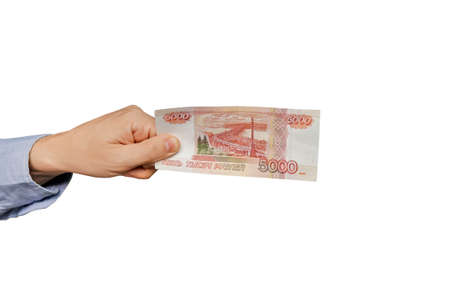 Banknote are in denominations of 5000 rubles in hands isolated on white backgroundの写真素材