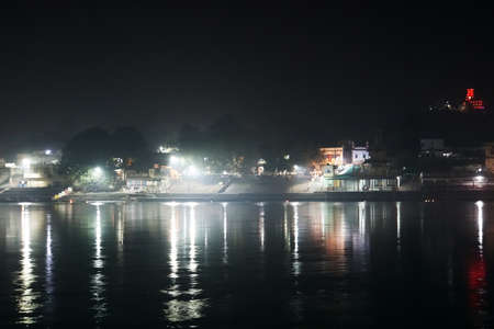 Ghats on shore river Ganges originates at Gangotri in Himalayas, skirting Rishikesh city in Dehradun, Uttarakhand, India. It is known as the Yoga Capital of the World.の写真素材
