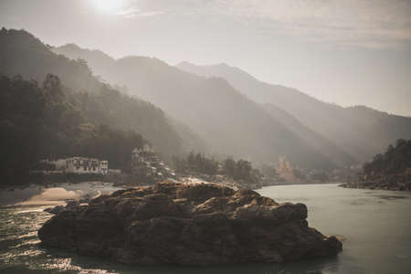 ganges river near rishikesh in india. Beautiful mountain landscape of the Himalayas. sad beautiful landscape of the foothills of the Himalayas.の写真素材