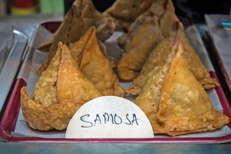 Deep Fried Samosa. Traditional Indian pie on the counter in the store.の写真素材