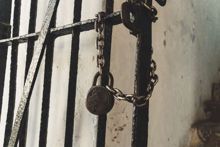 Old door rusty. old padlock chain lock a imprison concept.の写真素材