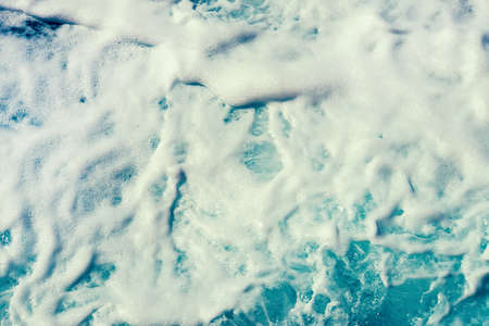 foam on the blue sea. sea water top view. sea foamの写真素材